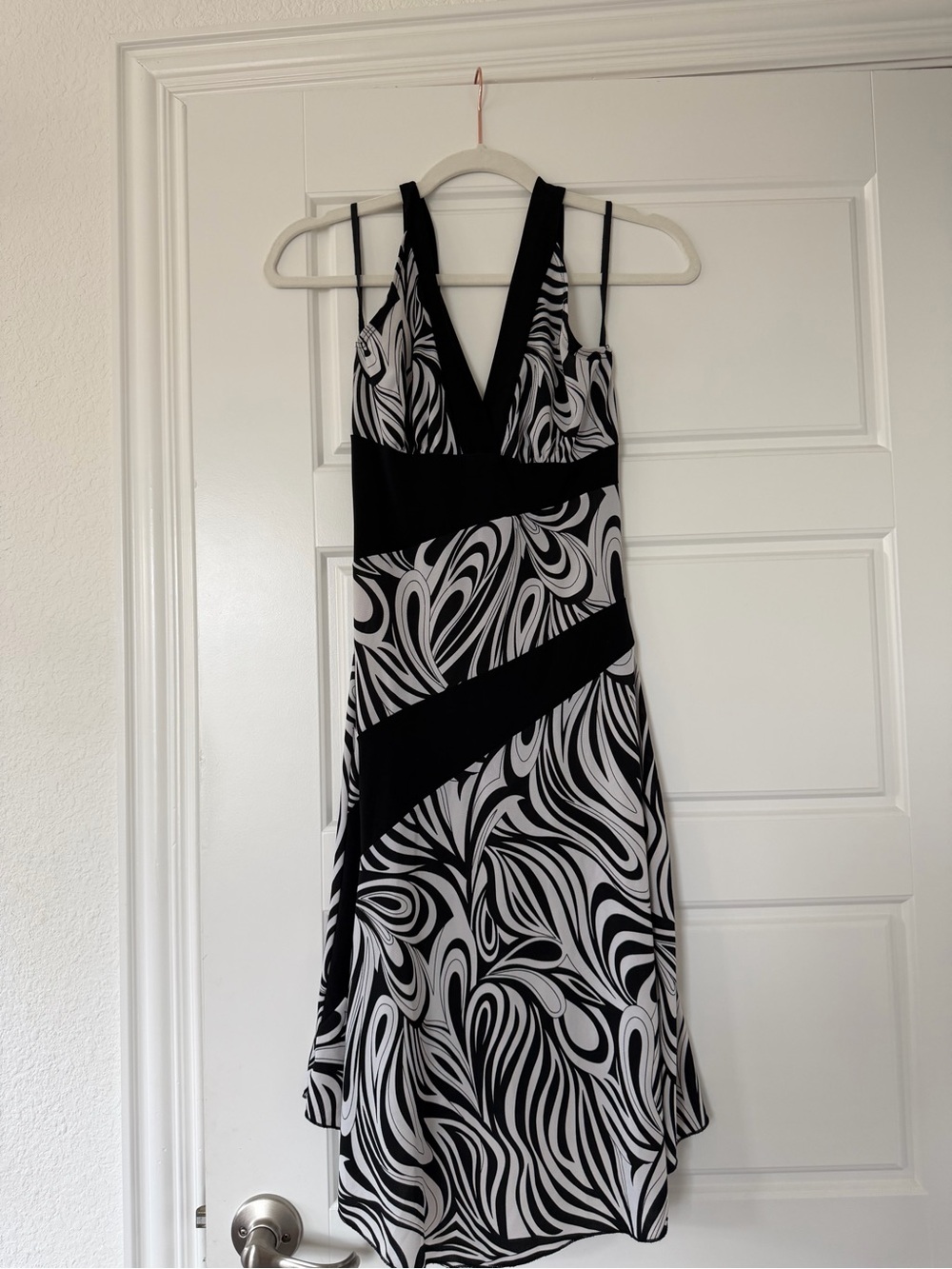 Black & White V-Neck Midi Dress with Abstract Swirl Pattern